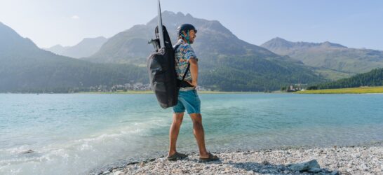 man carrying hip hop pump foiling backpack