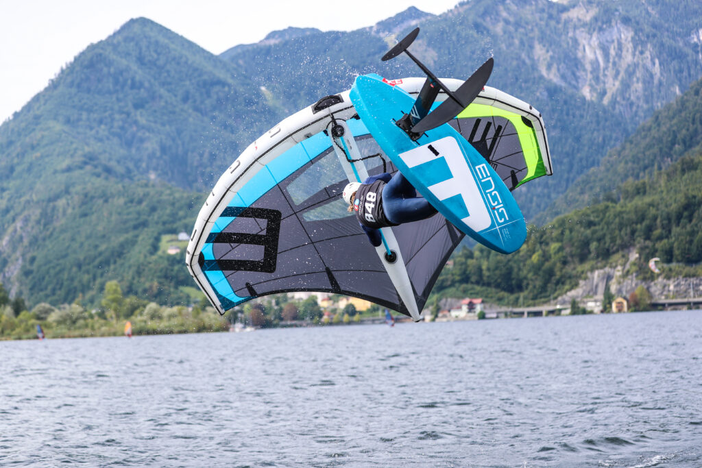 man using ENSIS equipment to do wing foiling tricks 