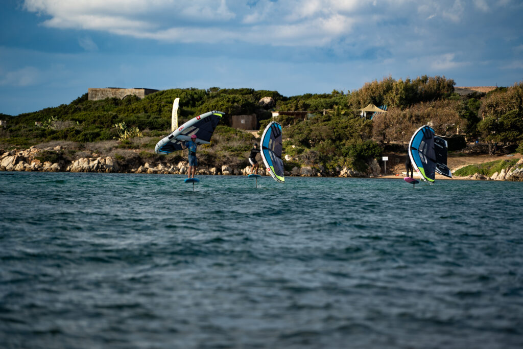a group out on the water wing foiling