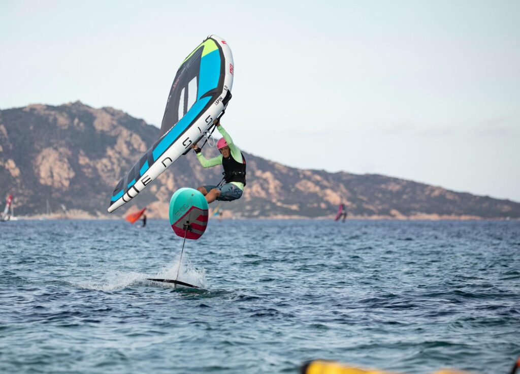 person taking great height on a wing foil